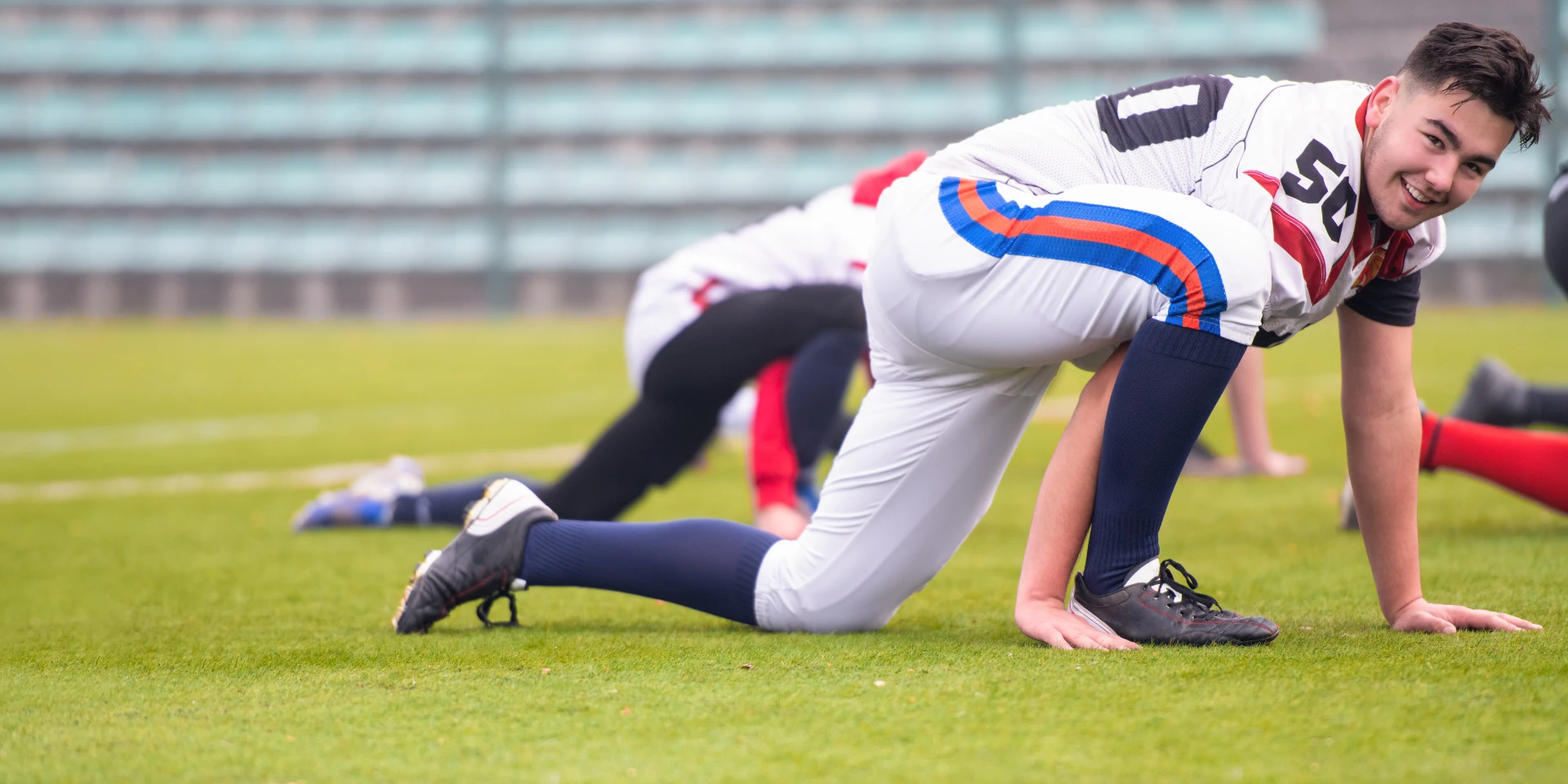 The importance of stretching for Football Players Header